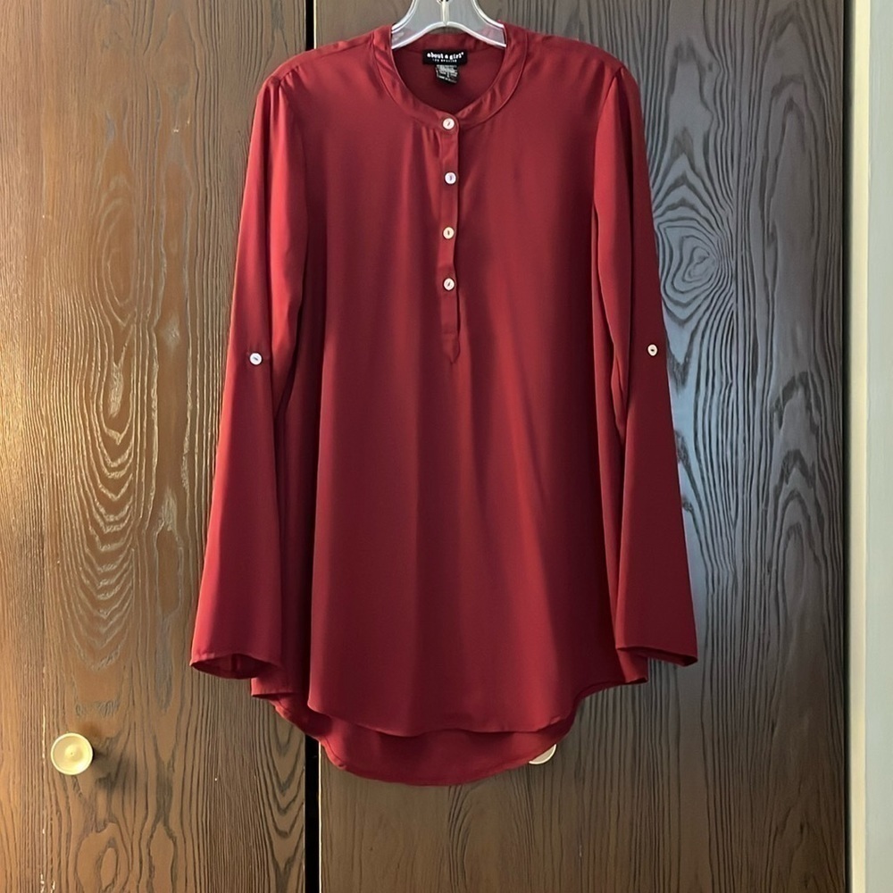 About A Girl wine colored long sleeved, long blouse. Lightweight. Size Large